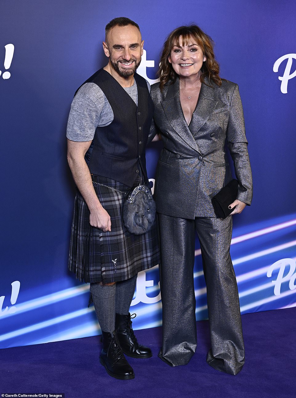Besties! For the evening she was joined by her pal and Lorraine's fashion guru Mark Heyes, who channelled his Scottish heritage with a kilt for the evening