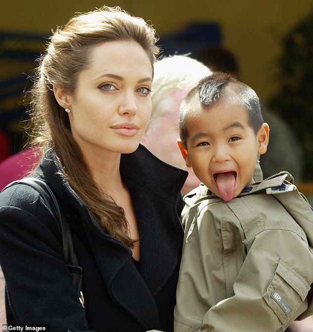 Angelina Jolie penned a two-page letter to California Governor Gavin Newsom urging him to support a bill that would provide domestic violence training for judges. The actress is pictured with her son Maddox in July 2005