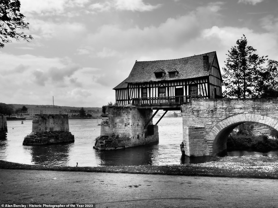 This striking photo of an old mill house perched on an abandoned bridge over the River Seine in Vernon, France, was taken by Alan Barclay. It features on the World History Shortlist