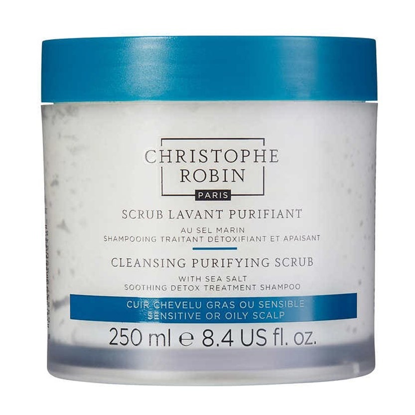 Christophe Robin Cleansing Purifying Scrub with Sea Salt, transparentes Glas mit Salzpeeling für die Kopfhaut, mit blauem Deckel auf weißem Hintergrund