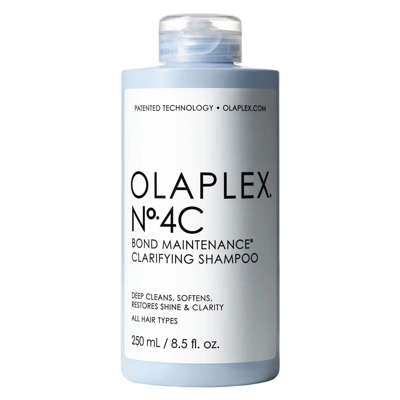 Olaplex No.4C Bond Clarifying Shampoo in blauer Flasche mit weißem Etikett auf weißem Hintergrund