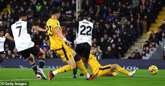 LONDON, ENGLAND - NOVEMBER 27: Alex Iwobi of Fulham FC scores their teams first goal  during the Premier League match between Fulham FC and Wolverhampton Wanderers at Craven Cottage on November 27, 2023 in London, England. (Photo by Chloe Knott - Danehouse/Getty Images)