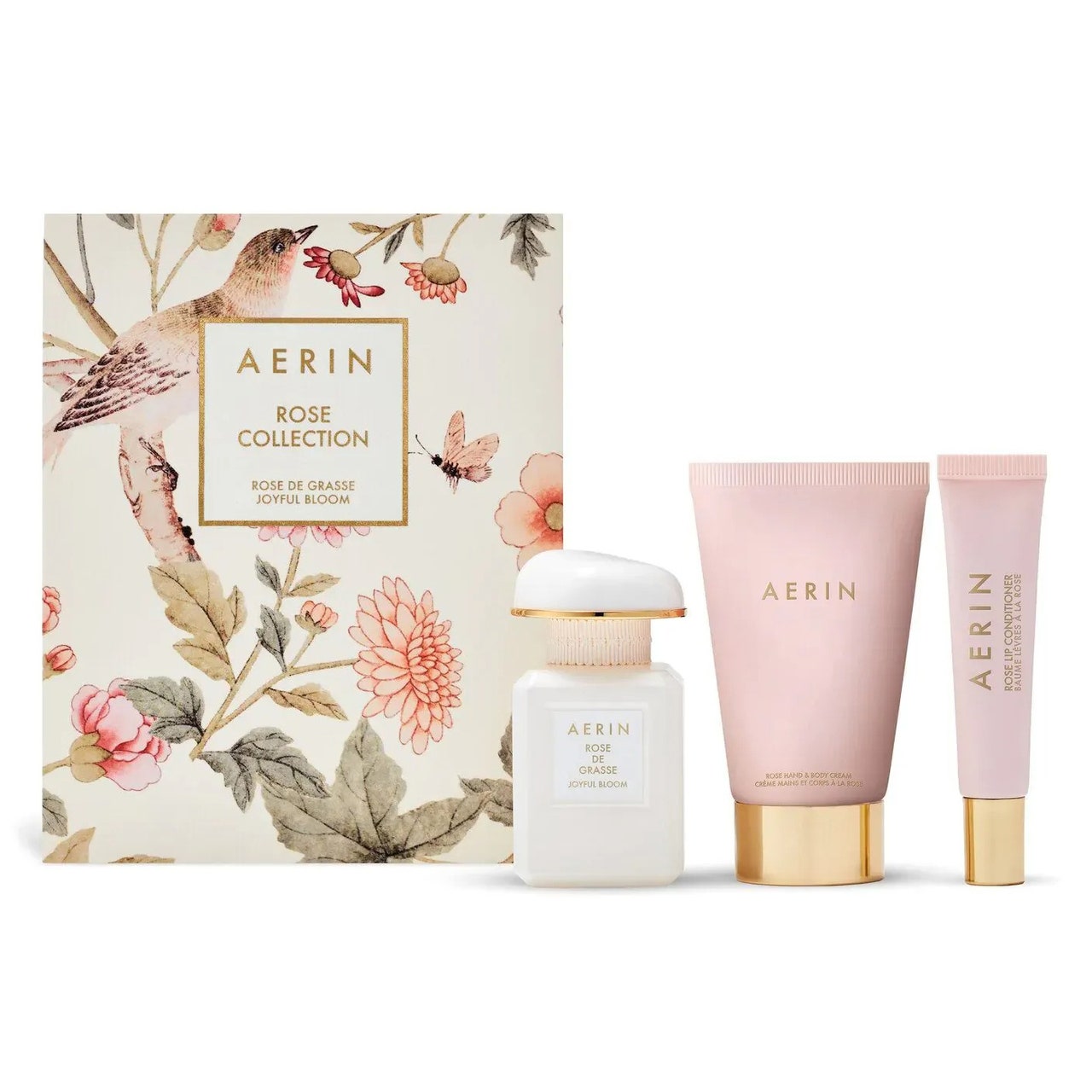 Aerin Rose de Grasse Collection Eau de Parfum Set weiße und rosa Parfümflaschen und Blumenschachtel auf weißem Hintergrund