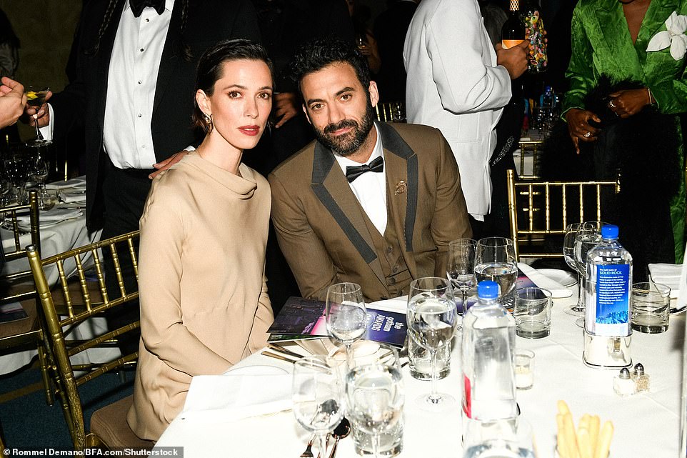 Hall and her husband Morgan Spector sat side-by-side at the event
