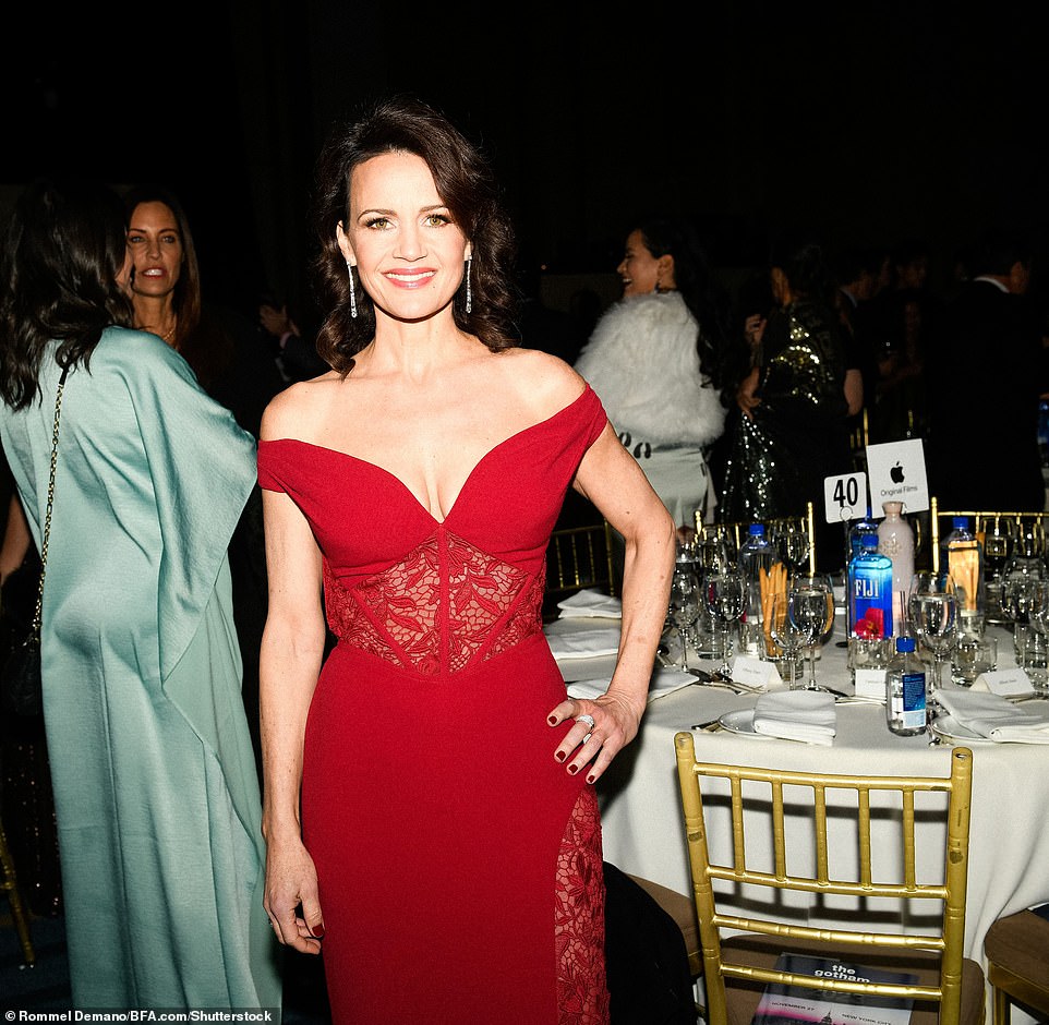 Red hot! Actress Carla Gugino wore a red lace dress