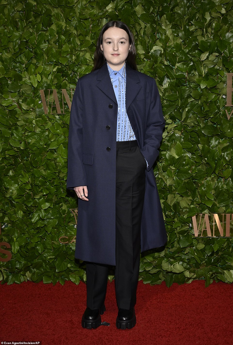 Nominee: Bella Ramsey, who identifies as non-binary and uses they/them pronouns, wore a long navy coat over a blue button-down, tucked into a pair of black trousers