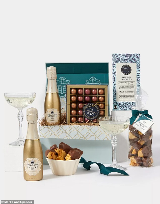 Treat someone special to a luxurious chocolate and fizz gift box from M&S, filled with scrumptious treats and sparkling booze