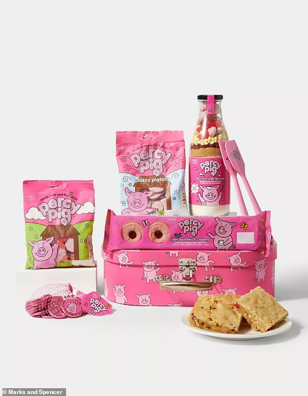 M&S' playful Percy Pig¿ suitcase is crammed with yummy treats and baking goods, perfect for creative youngsters - or the young at heart