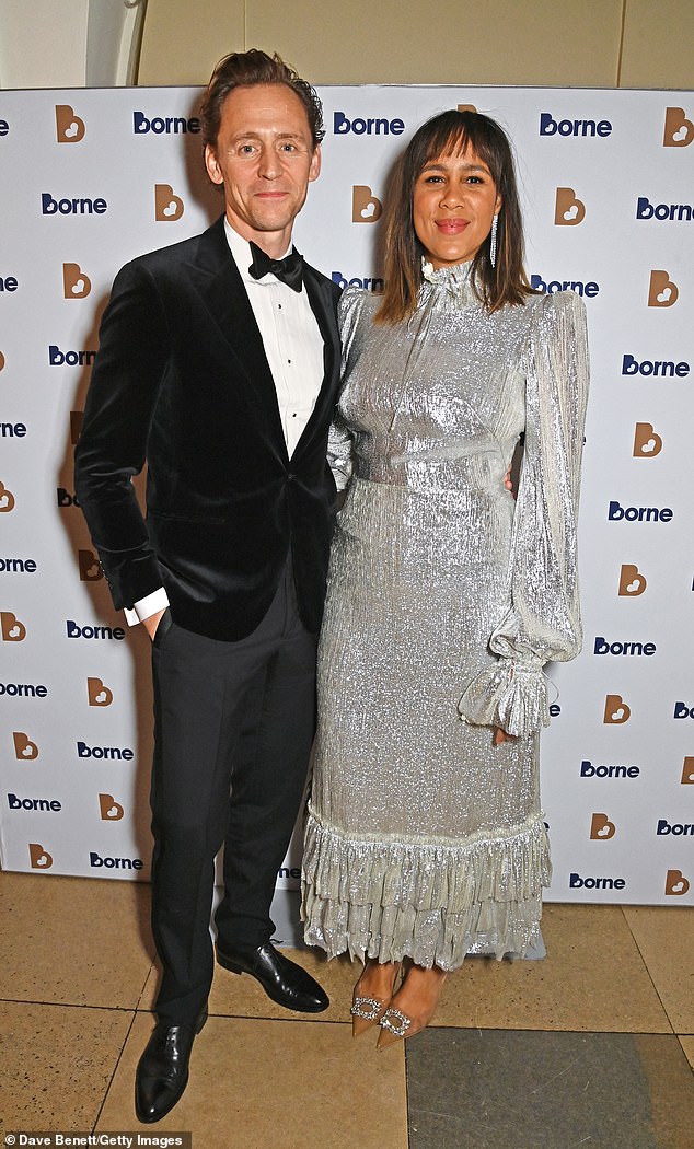 Paar: Zawe Ashton machte eine glamouröse Figur, als sie am Donnerstagabend ihren eleganten Verlobten Tom Hiddleston bei der Borne to Dance Gala in London begleitete