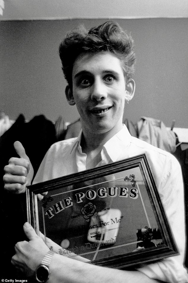 He was a punk, a poet, an icon of Irish ballads and an extraordinary songwriter. Shane MacGowan, who has died at the age of 65, was the man who brought us all to tears with his lyrics. Above: MacGowan in 1984