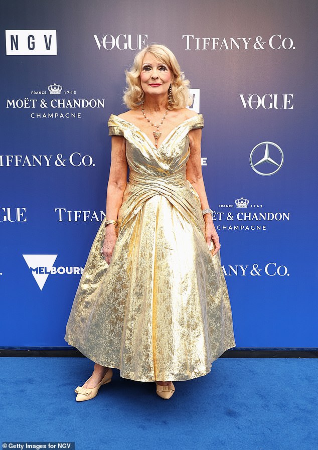 Philanthropist Krystyna Campbell-Pretty (pictured) glistened in gold, choosing an old Hollywood style gown paired with ribbon heels