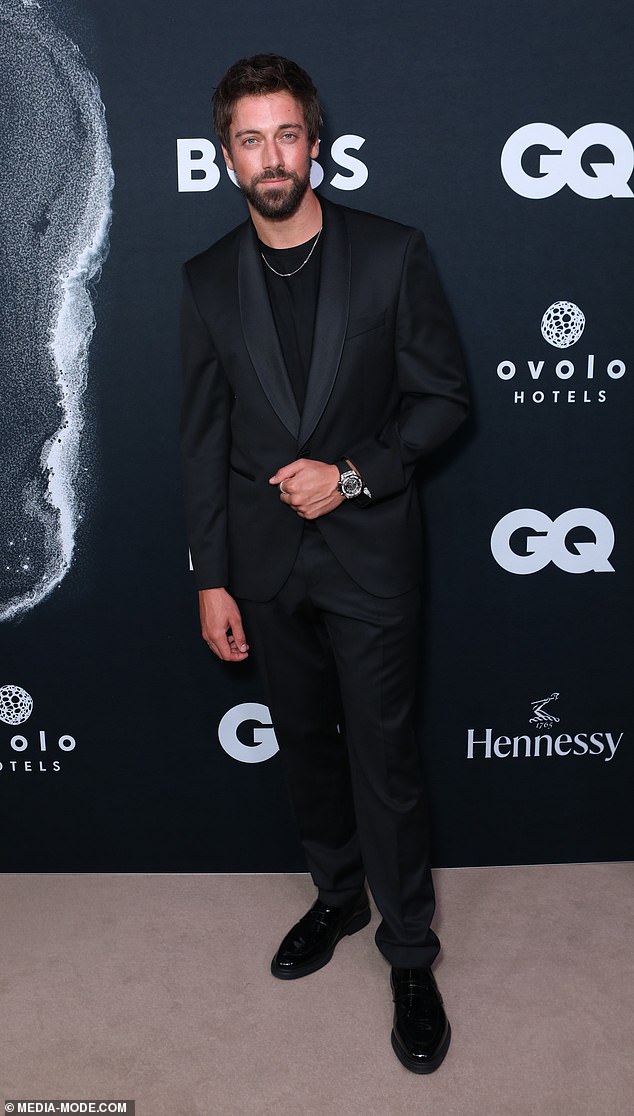 Lincoln Younes made sure his timepiece was front and centre as he posed on the red carpet in a classic suit and black tee combo. Pictured