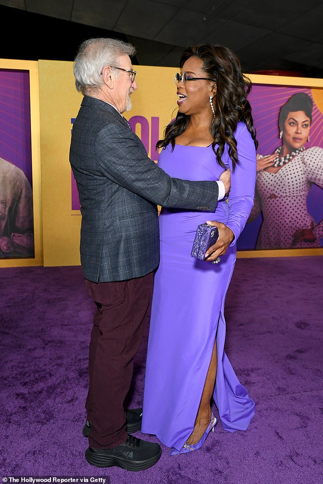 The duo shared a sweet moment together on the purple carpet