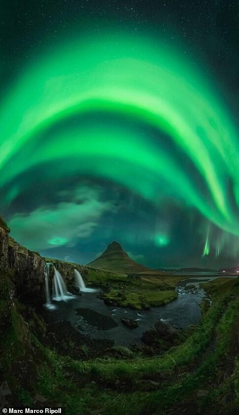 Iceland's sky played host to arcs of neon green during Marc Marco Ripoll's second night in the country. 'Timid auroras emerged on the horizon behind the popular Mt.Kirkjufell,' he shared