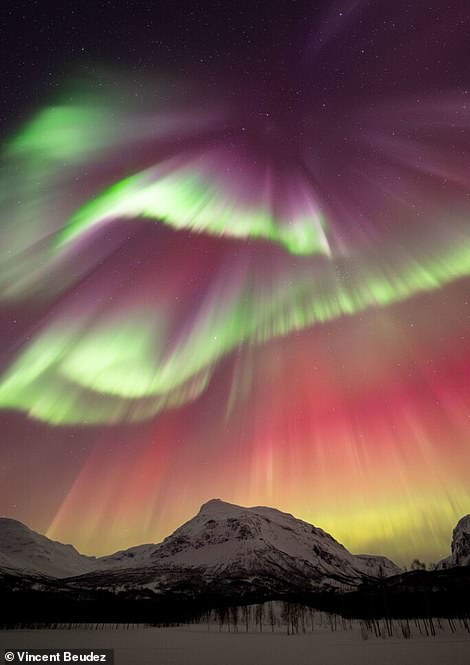 'This is the moment we live for,' said Vincent Beudez of the above image, which he took in northern Norway. He added: '[It was] the most colourful Northern Lights I’ve ever witnessed'