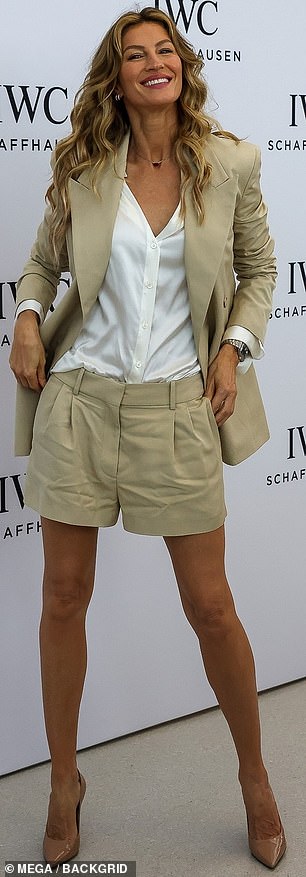 The top was tucked into a pair of high-cut khaki shorts that played up her vertiginous legs and emphasized her impressively svelte waistline