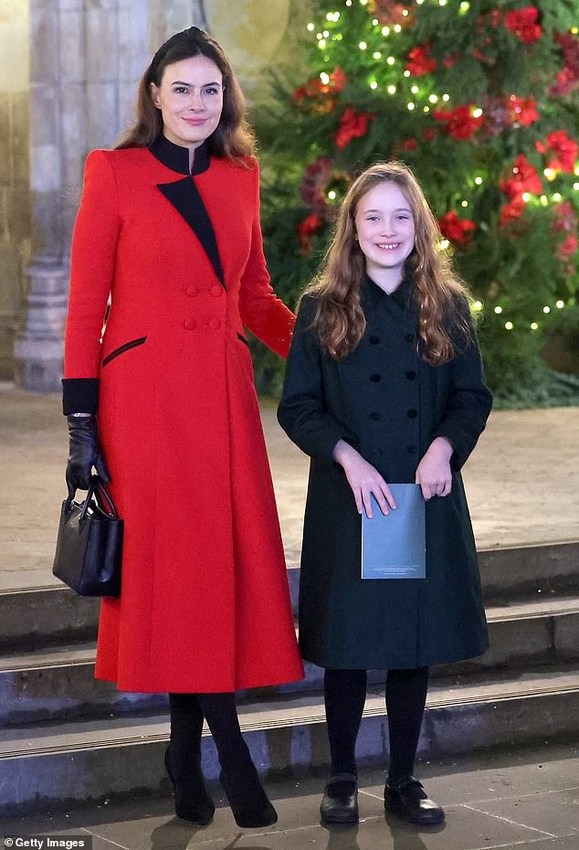 Lady Windsor, 43,  pictured with daughter Maud, who is married to King Charles' second cousin Lord Frederick Windsor , showed off her showbiz roots in the vampy Christmas coat with black gloves