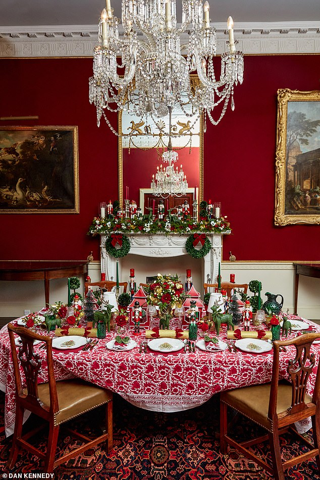 If you're going for a traditional Christmas look, a red table cloth is a great place to start. Add green glassware and gold Christmas crackers with red velvet bows