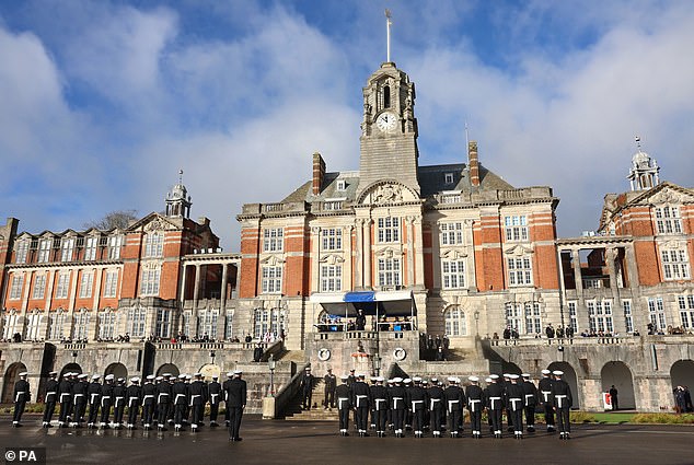 Pictured: A parade of Royal Navy cadets stand to attention at the Lord High Admiral's Divisions at the Britannia Royal Naval College
