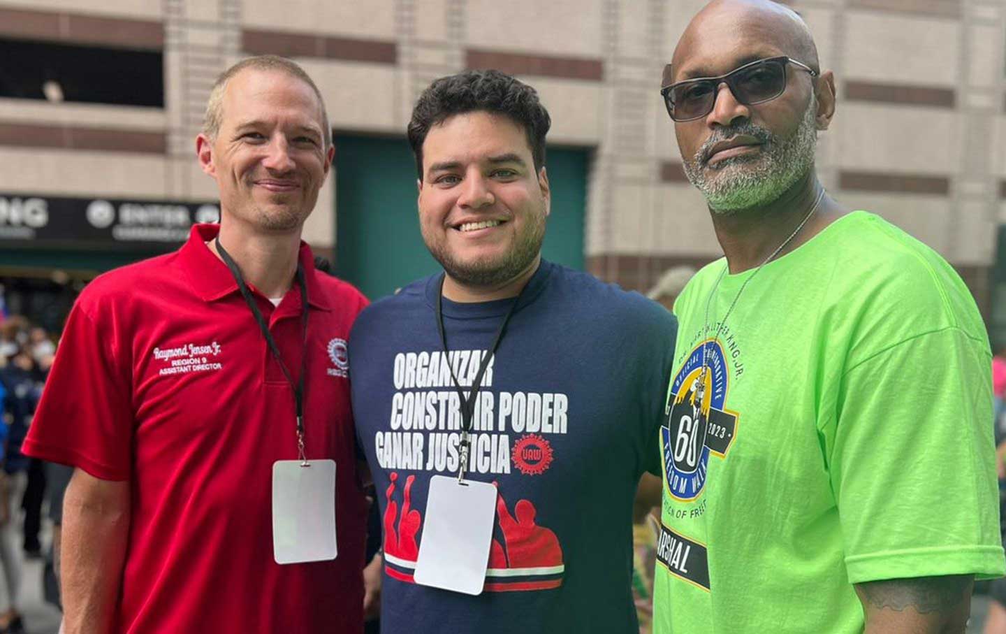 Brandon Mancilla (center) with Ray Jensen Jr., UAW Region 9 Assistant Director (left) and UAW member Donald Foster.