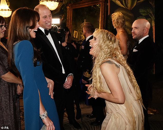 The Prince and Princess of Wales laugh with Paloma Faith during the evening at the Royal Albert Hall