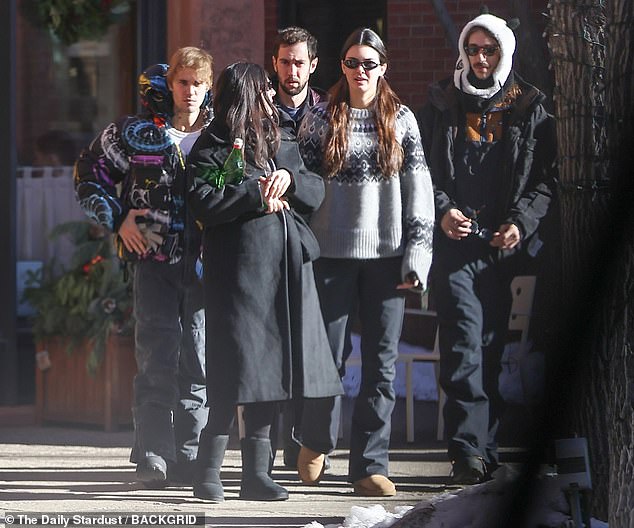While on their Sunday outing, Justin also bundled up, and wore a colorful puffer jacket, black pants and boots