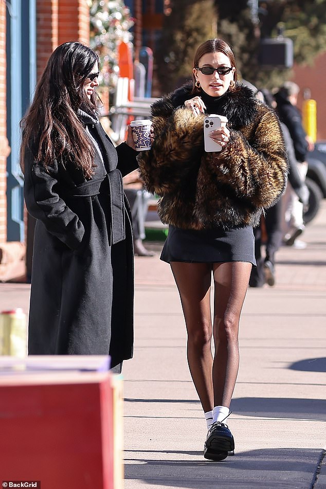 Justin's wife also joined in, and looked stylish in a fur jacket and black mini skirt