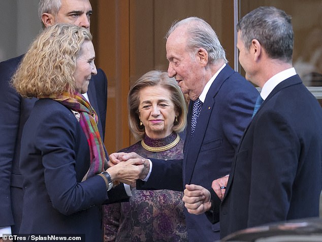 The royal was cheerful as he chatted with others at the birthday celebrations in Madrid earlier today