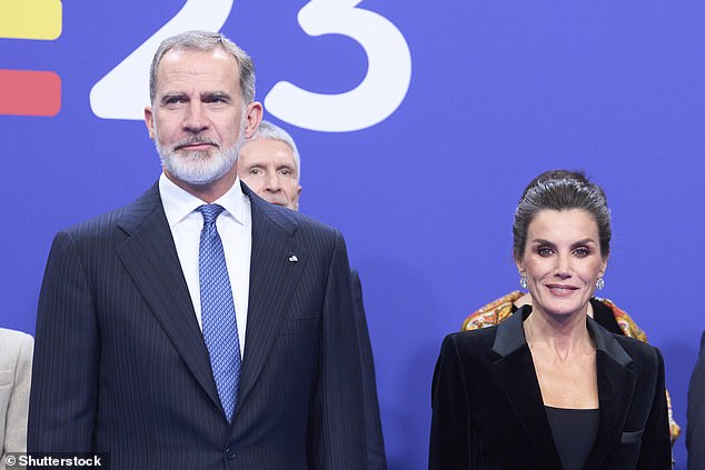 The King and Queen beamed as they stood with other EU delegates at the National Auditorium in Madrid