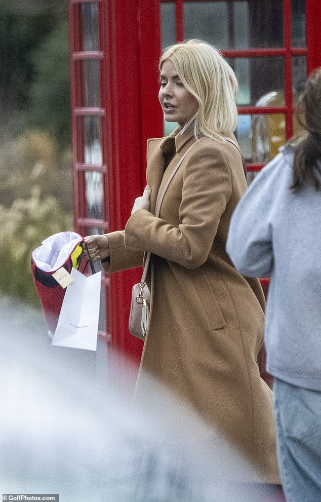 Holly was seen leaving the venue, where it is understood she and her group hired a private room, with two female friends. She later walked down the road to a waiting car