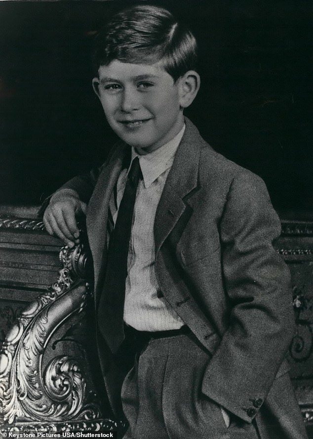 King Charles is pictured in a portrait taken for his ninth birthday in 1957 - with his right hand proudly on display