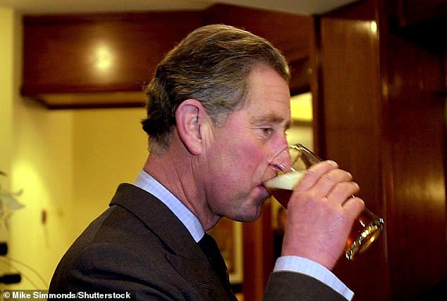 King Charles pictured sipping on a pint in a Dorset pub in 2002