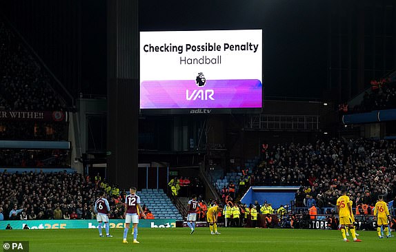 General view of a VAR check for a possible penalty from a handball during the Premier League match at Villa Park, Birmingham. Picture date: Friday December 22, 2023. PA Photo. See PA story SOCCER Villa. Photo credit should read: Mike Egerton/PA Wire.RESTRICTIONS: EDITORIAL USE ONLY No use with unauthorised audio, video, data, fixture lists, club/league logos or "live" services. Online in-match use limited to 120 images, no video emulation. No use in betting, games or single club/league/player publications.