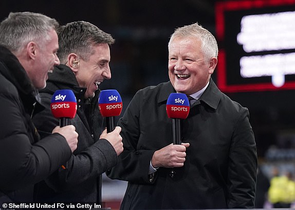 BIRMINGHAM, ENGLAND - DECEMBER 22: Chris Wilder manager of Sheffield United enjoys the pre match talk to Sky Tv's pundits Jamie Carragher and Gary Neville before the Premier League match between Aston Villa and Sheffield United at Villa Park on December 22, 2023 in Birmingham, England. (Photo by SportImage/Sheffield United FC via Getty Images)