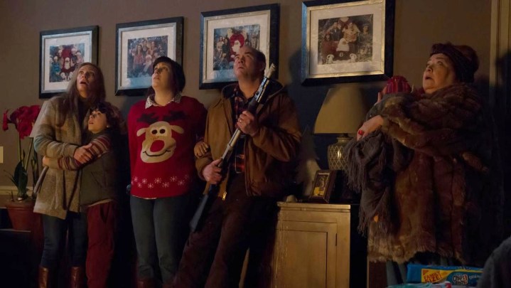 A family looks up at a monster in Krampus.