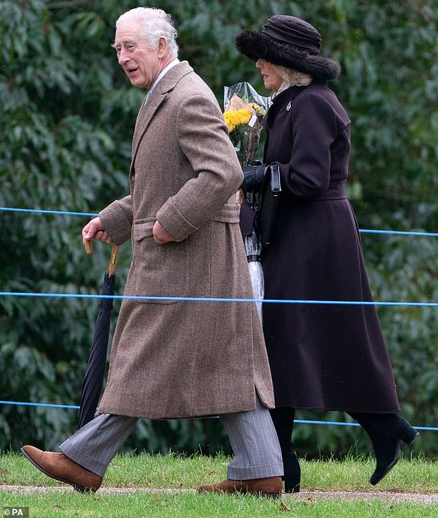 Queen Camilla held a bouquet of yellow roses, given to her by a royal fan outside the church as the couple made their way from the service