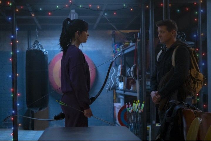 Hailee Steinfeld and Jeremy Renner as Hawkeye and Karen Bishop both pointing bows and arrows in a scene from Hawkeye on Disney+.