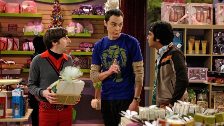 Howard, Sheldon, and Raj buying gift baskets in The Big Bang Theory.