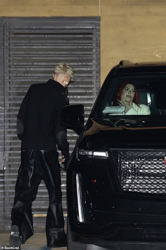 MGK was every bit the gentleman as he opened the door of the Cadillac Escalade for Megan