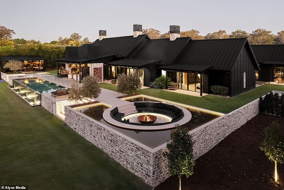 This chic multimillion-dollar home in Chandler caught Brisbane's attention in 2023. It boasts luxury features including an infinity-edge pool, sauna, wine cellar, high-end bar and water-surrounded conversation pit