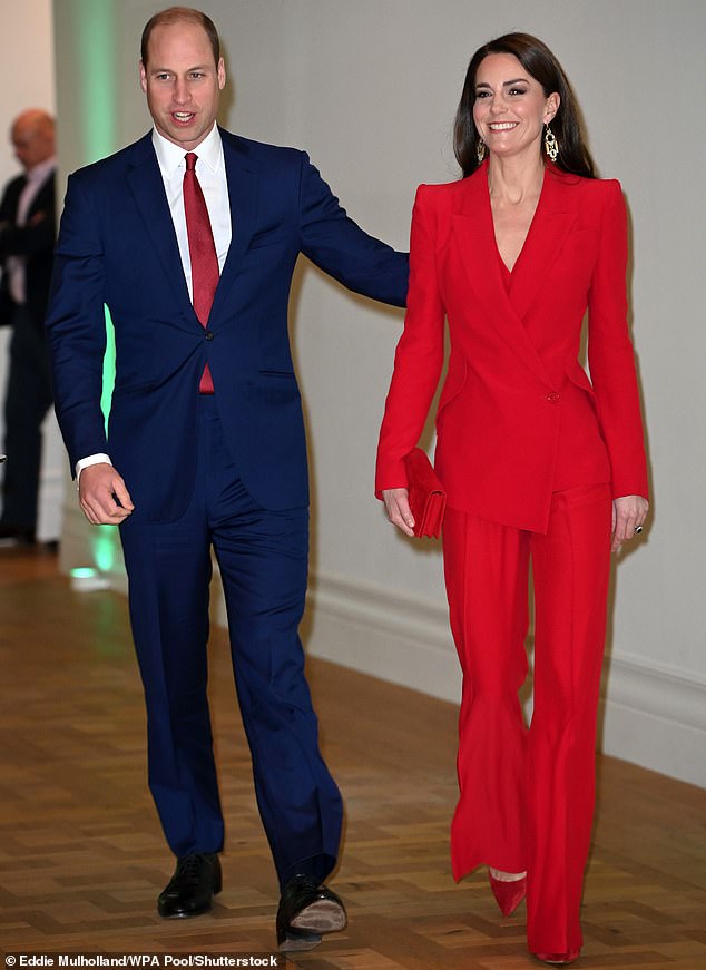 Kate radiated glamour in a red Alexander McQueen suit, matched with ornate drop earrings by Chalk for an event hosted by the Princess's Royal Foundation Centre for Early Childhood