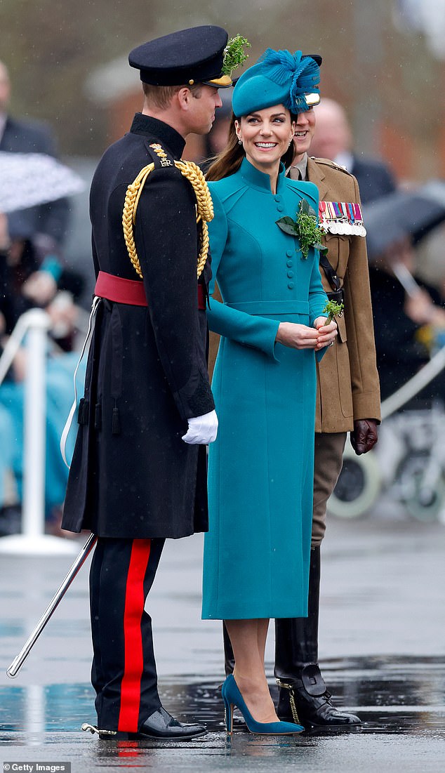 Celebrating her first St Patrick¿s Day as Colonel of the Irish Guards, Kate chose a teal ensemble and looked appropriately regal in a bespoke Catherine Walker tailored coatdress with a high collar and strong shoulders easily won coat of the year