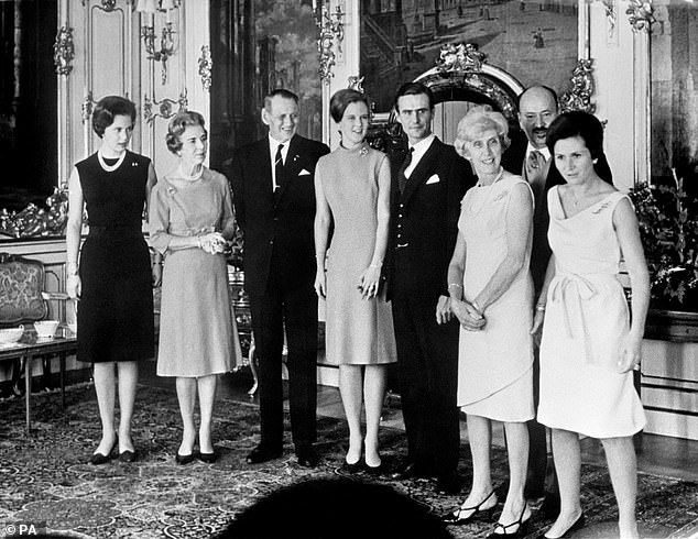 Margrethe was studying in London when she met her future husband Henrik (Pictured: Queen Ingrid, King Frederik, Princess Margrethe, Count Henri, Countess and Count Andre de Monpezat and their daughter Madam Bardin, celebrating the engagement of Crown Princess Margrethe to Count Henri)
