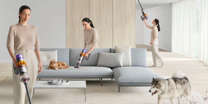 The Dyson V15 cordless vacuum being used in many different ways in a white living room.
