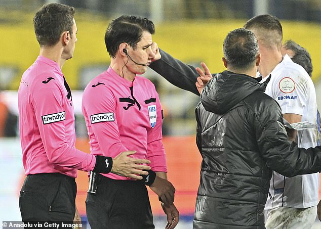The MKE Ankaragucu president launched the vicious attack (pictured) on referee  Meler (second left) after his side drew 1-1 against Caykur Rizespor in the Super Lig
