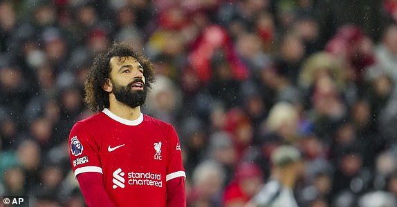 Liverpool's Mohamed Salah reacts during the English Premier League soccer match between Liverpool and Newcastle, at Anfield stadium in Liverpool, England, Monday, Jan. 1, 2024. (AP Photo/Jon Super)