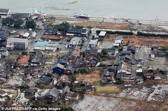 TOPSHOT - This aerial photo provided by Jiji Press shows damage in the city of Suzu, Ishikawa prefecture on January 2, 2024, a day after a major 7.5 magnitude earthquake struck the Noto region in Ishikawa prefecture. Japanese rescuers battled against the clock and powerful aftershocks on January 2 to find survivors of a major earthquake that struck on New Year's Day, killing at least 30 people and causing widespread destruction. (Photo by JIJI PRESS / AFP) / Japan OUT (Photo by STR/JIJI PRESS/AFP via Getty Images)