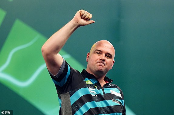 Rob Cross reacts after losing to Luke Littler (not pictured) on day fifteen of the Paddy Power World Darts Championship at Alexandra Palace, London. Picture date: Tuesday January 2, 2024. PA Photo. See PA story DARTS World. Photo credit should read: Zac Goodwin/PA Wire.RESTRICTIONS: Use subject to restrictions. Editorial use only, no commercial use without prior consent from rights holder.