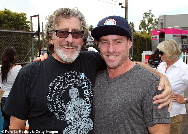 Glaser and Elzabeth's son, Jake, was infected with HIV in the womb. Paul Michael Glaser and Jake Glaser are pictured together