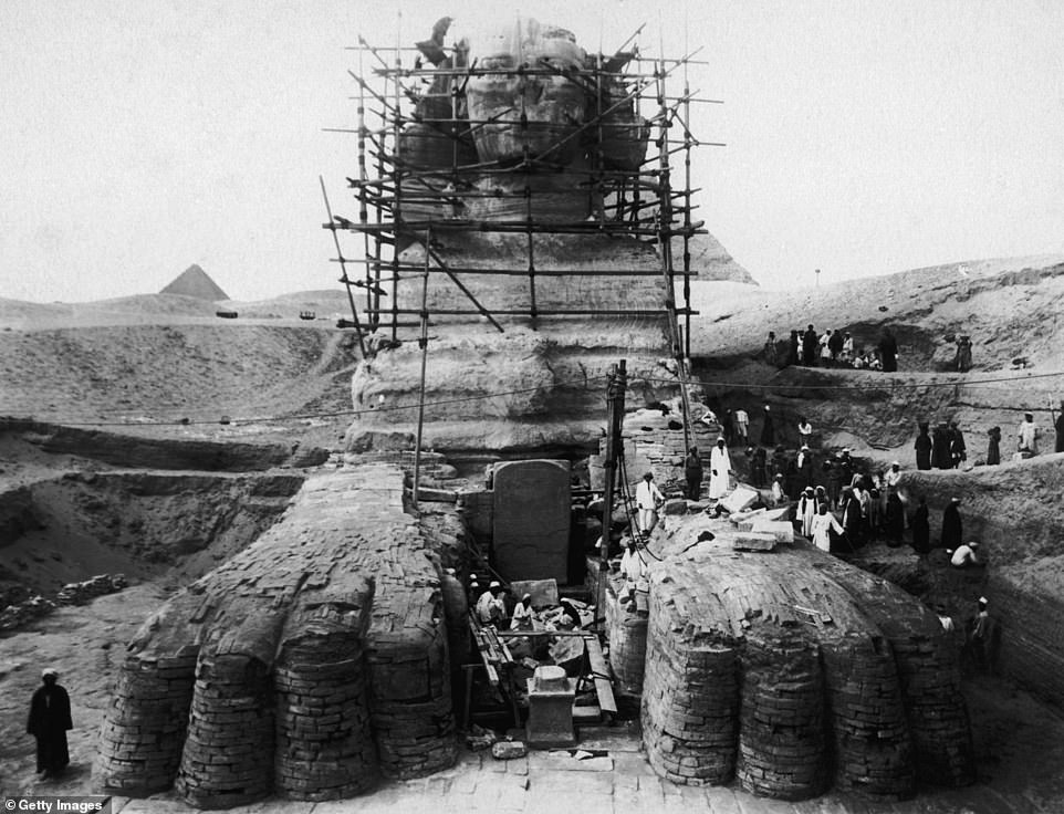 Work is carried out to excavate sand from around the body of the Great Sphinx of Giza in 1925. The project resulted in the statue being fully exposed for the first time since Giza was abandoned during the Middle Kingdom (c. 2040-1782 BCE)